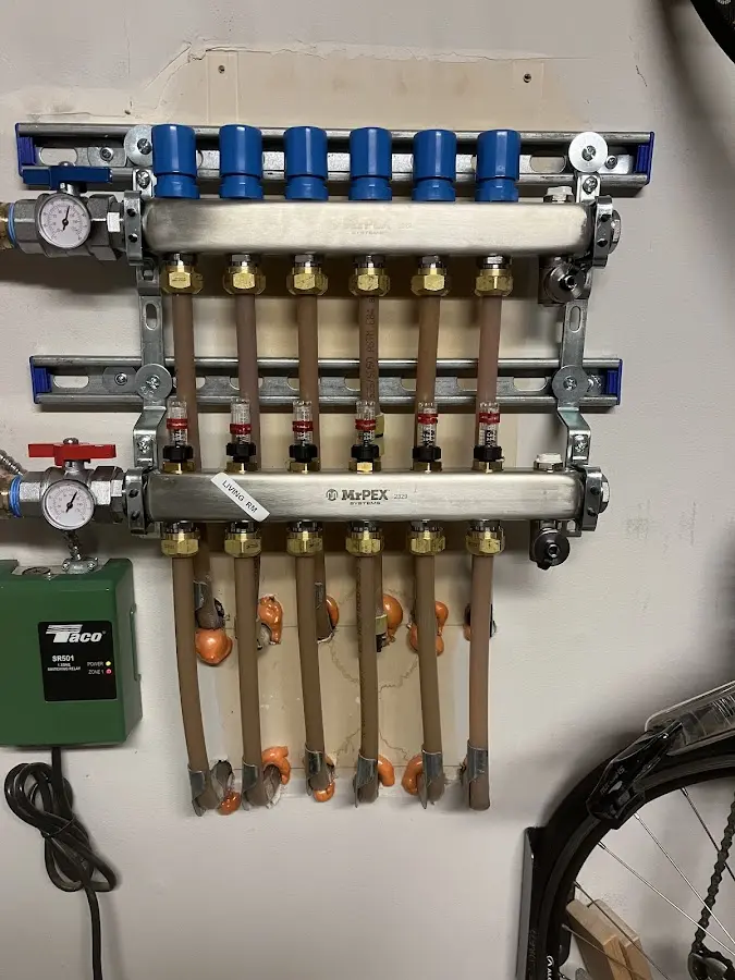 Plumber performing Water Heater Repair at a residential property in High Ridge